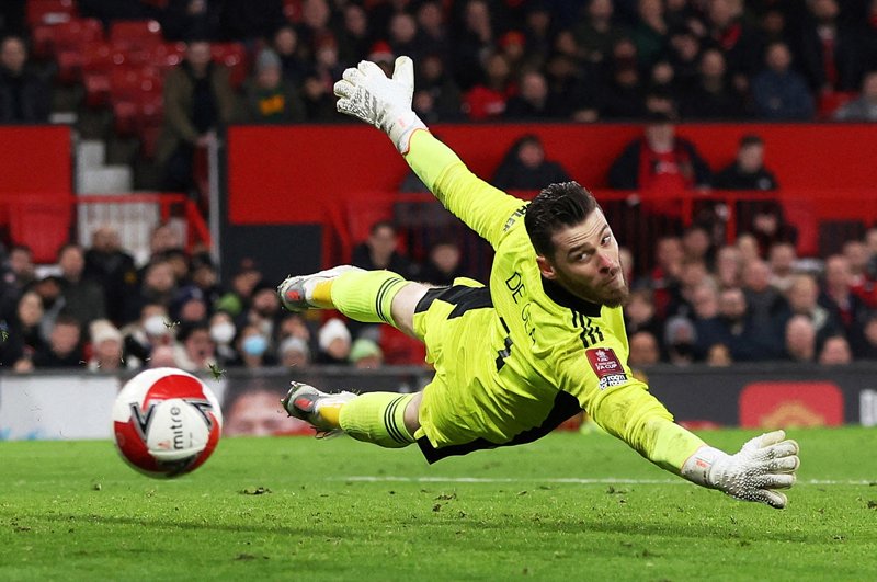 Thay đổi không khí với hình nền David De Gea, phản ánh tinh thần chiến đấu và sự chuyên nghiệp của anh.